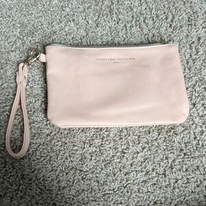 Light blush Wristlet with charger inside